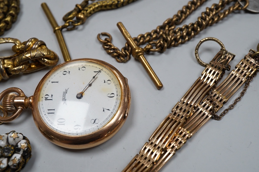 A group of gilt metal/pinchbeck jewels, 19th and early 20th century, comprising: a brooch of knotted design; two gate bracelets; a fancy link bracelet; an open-faced pocket watch; two oval panel brooches, and two watch c